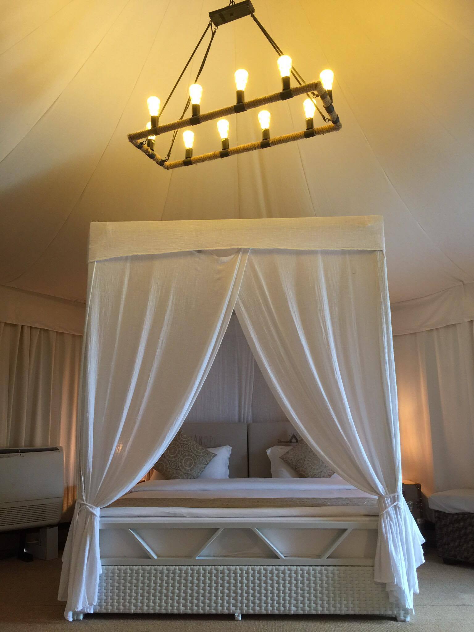 bed-at-the-canopi-bintan-resort-inside-tent
